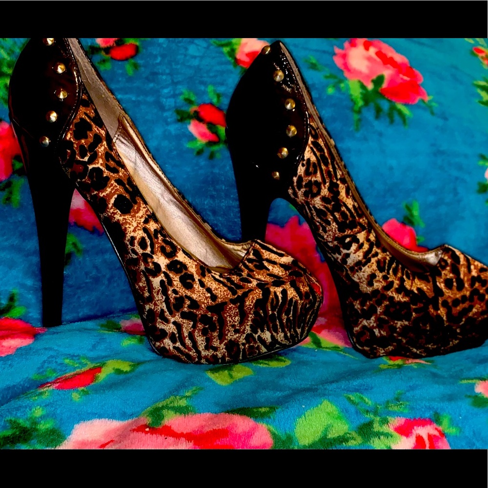 Charlotte Russe size 7 leopard print studded heels. In great condition !